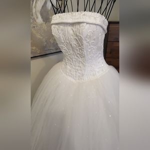 Tulle wedding dress with beaded satin bodice. New without tags.